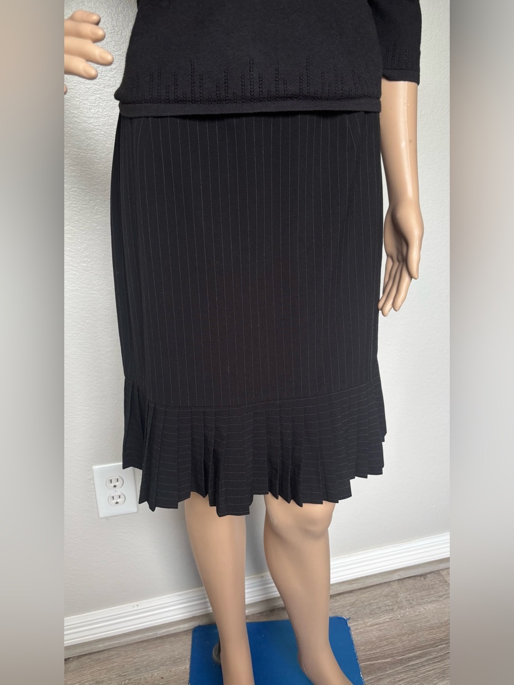 Skirtology Black Pinstripe knee Skirt with Pleated Hem